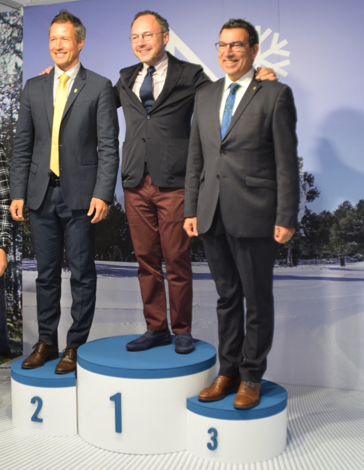 El cònsol major del comú d'Andorra la Vella David Astrié, el cap de Govern Xavier Espot i el cònsol menor del comú d'Andorra la Vella, Miquel Canturri, a l'estand de Naturland.