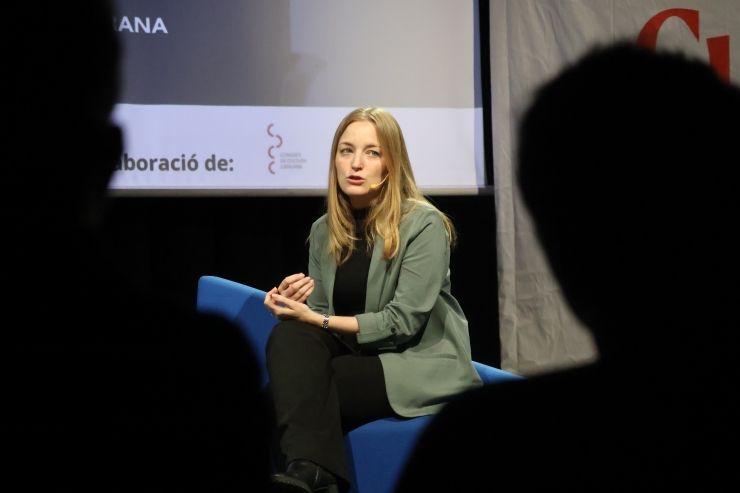 La responsable de recursos humans del centre d'oci Unnic, Marina Llompart, durant la xerrada 'El català al món dels negocis'.